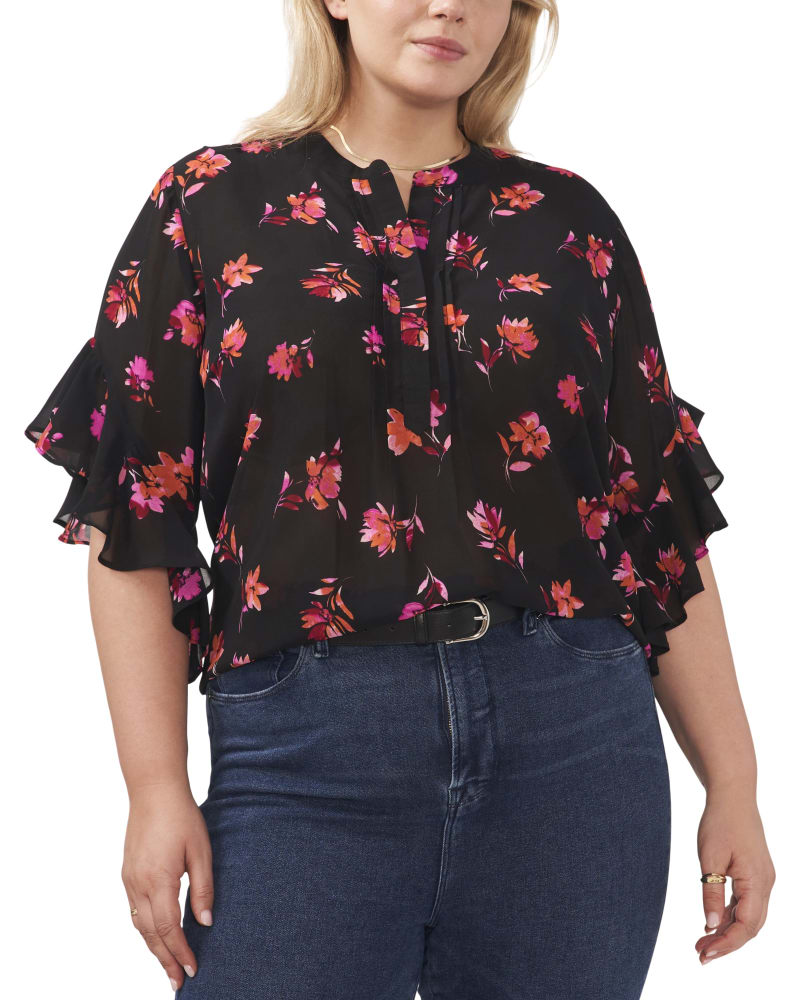 Front of a model wearing a size 1X Greta Flutter Sleeve Blouse in POM PINK by Vince Camuto. | dia_product_style_image_id:260843